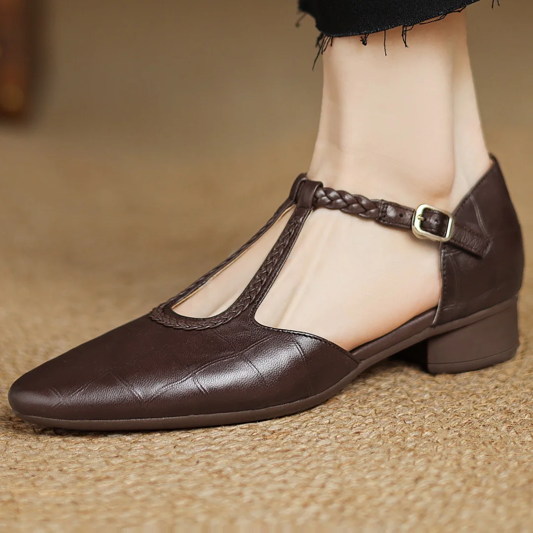 Greta – Zapatos de piel con tira en T y detalle trenzado