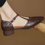 Greta – Zapatos de piel con tira en T y detalle trenzado