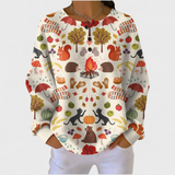Alma - Suéter color crema con motivo de bosque otoñal