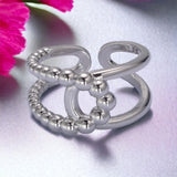 Anillo "Vittoria Trenzado Doble Banda" en color dorado o plateado