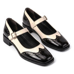 Gema: mary jane bicolor de charol, color negro, vista del par
