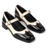 Gema: mary jane bicolor de charol, color negro, vista del par