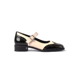 Gema: mary jane bicolor de charol, color negro, vista lateral