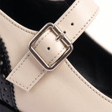 Gema: mary jane bicolor de charol, color negro, detalle