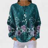 Nora - Suéter color petróleo con diseño floral