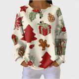 Olivia - Suéter color crema con motivos navideños