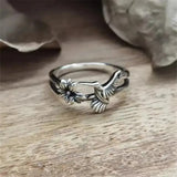 Anillo de plata retro con flor y golondrina