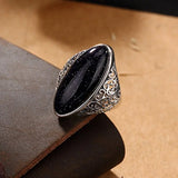 Anillo ovalado retro de plata con piedra