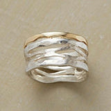 Anillo retro "Oco" en oro y plata
