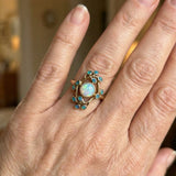 Anillo retro azul con cristales y ópalo