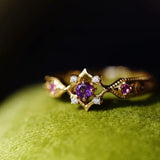 Anillo geométrico retro ajustable en oro con cristales morados de amatista