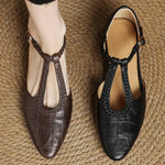 Greta – Zapatos de piel con tira en T y detalle trenzado