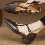 Greta – Zapatos de piel con tira en T y detalle trenzado