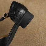 Greta – Zapatos de piel con tira en T y detalle trenzado