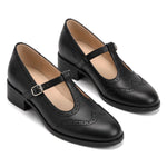 Susana: zapatos tira en t brogue, color negro, vista del par