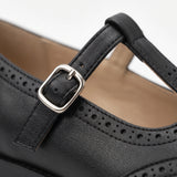 Susana: zapatos tira en t brogue, color negro, detalle