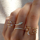 Conjunto de anillos dorados retro brillantes