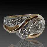 anillo vintage irregular en oro y plata con circonitas