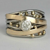 Anillo vintage con incrustaciones de circonita y oro