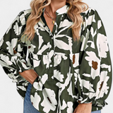 Filomena Blusa con Media Botonadura y Manga Abullonada en Estampado Floral Abstracto